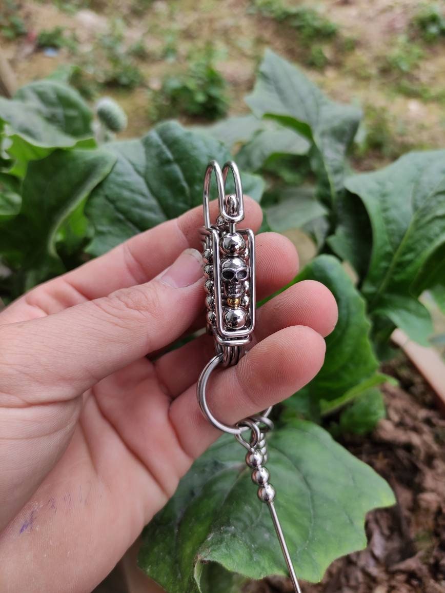 The Rebel Skull | Wire-Wrapped Stainless Steel Keychain